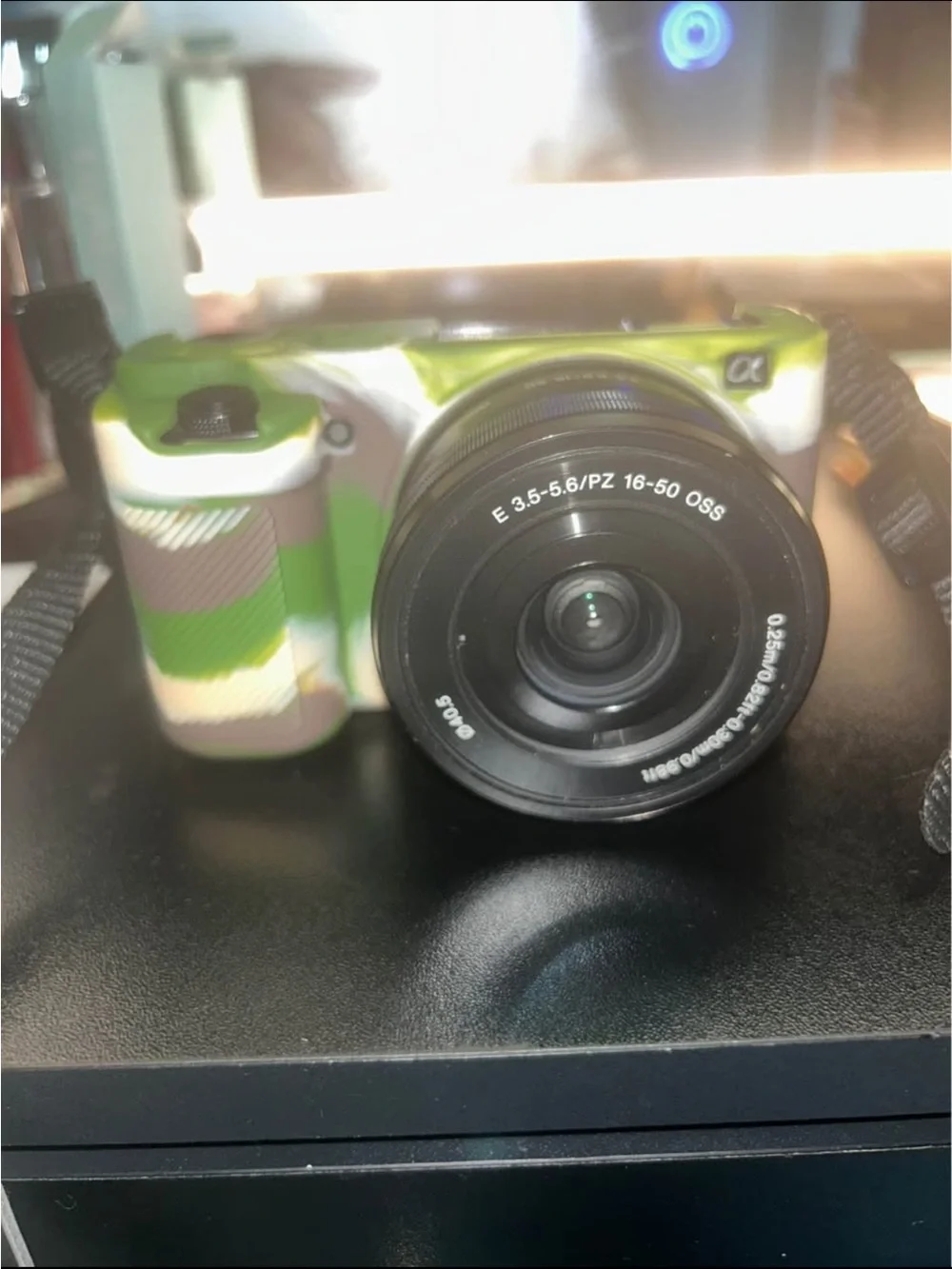 Sony ZVE10 Camera in Green Camouflage Case with 16-50mm Lens